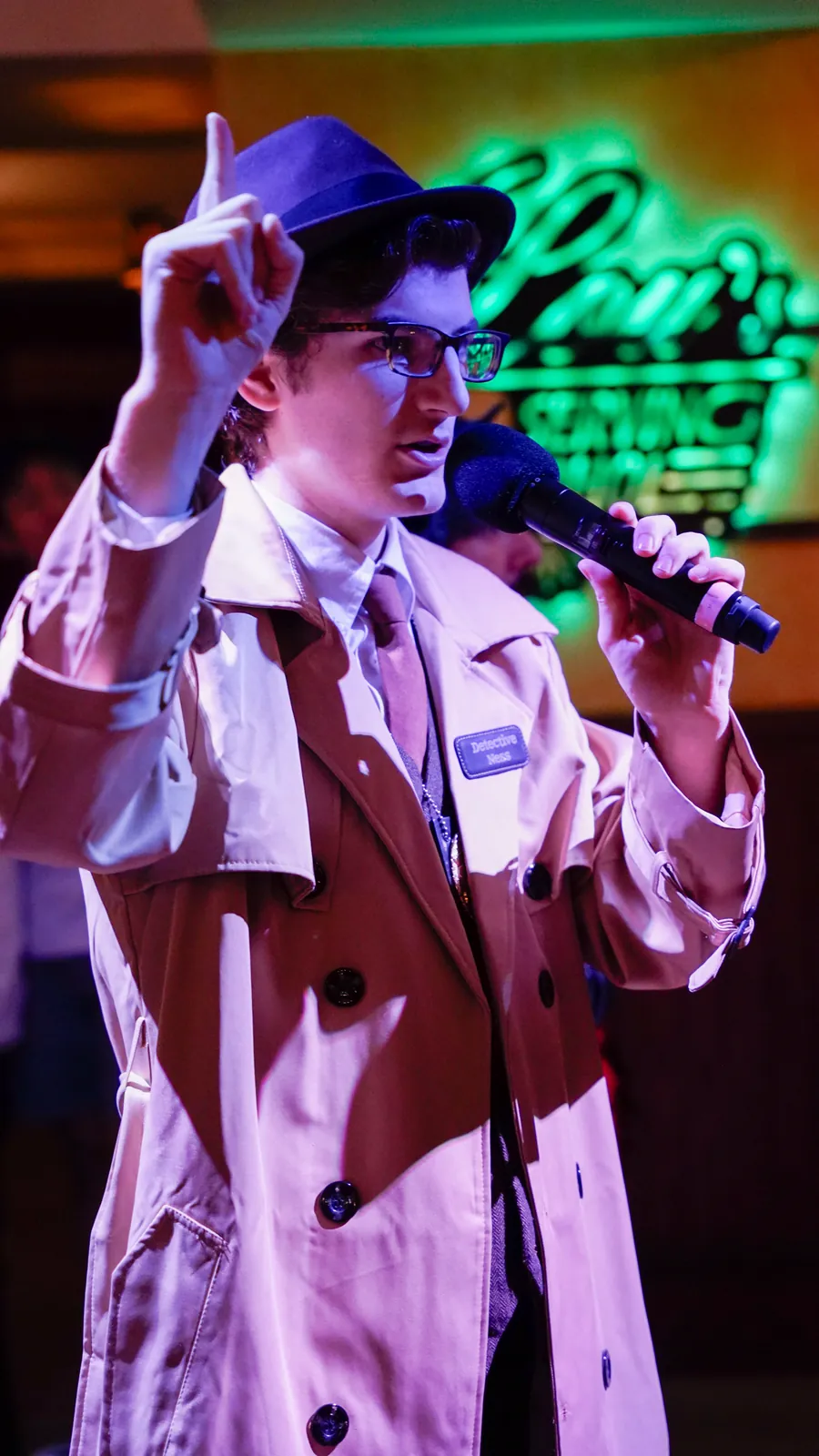 A Murder Mystery Company actor working the room at a Columbia show